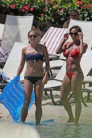 alex_morgan_and_sydney_leroux_in_bikinis_on_the_beach_in_hawaii_11.jpg