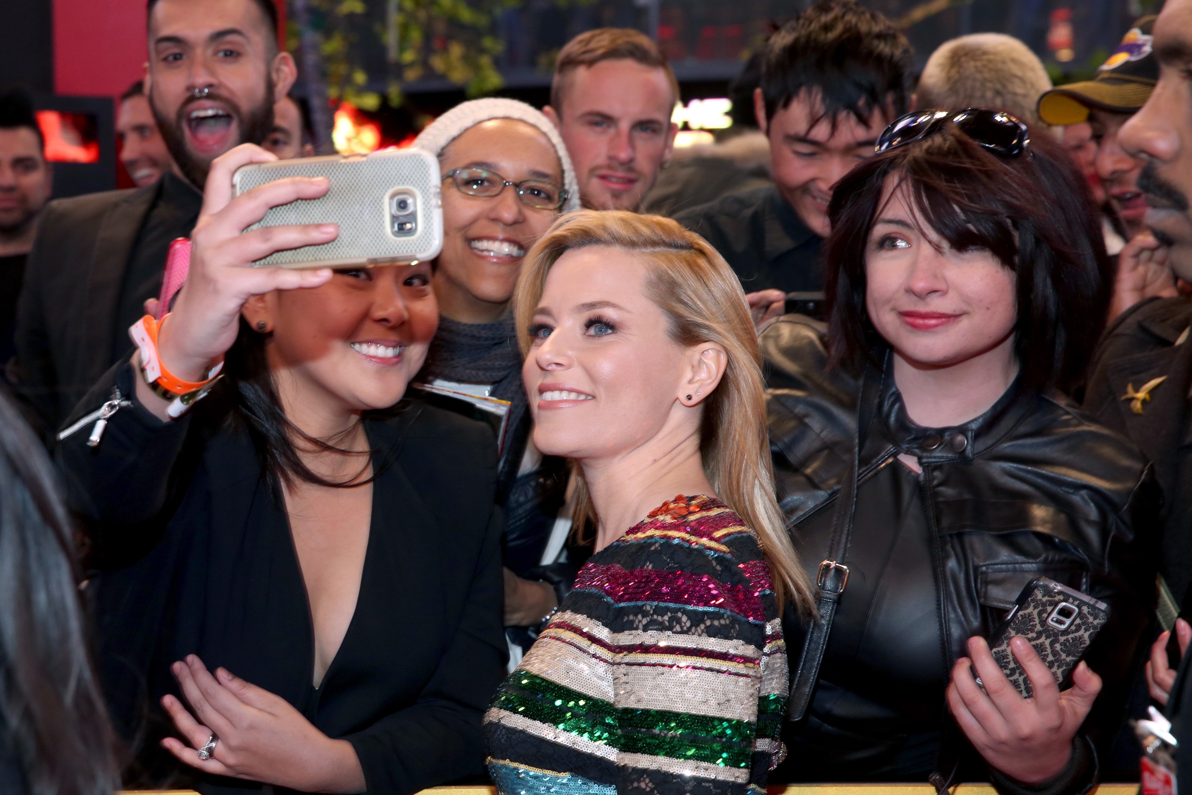 Take fans. Elizabeth Banks and Fan.