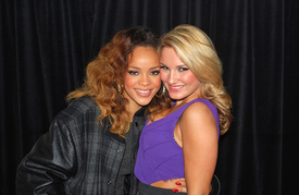 Rihanna backstage with Sam Faiers after concert at the O2 Arena London 20.12.2011.jpg