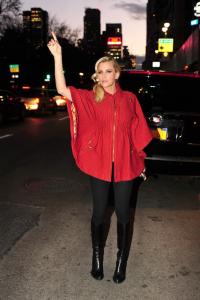 08 Jenny McCarthy 2012-12-06 - hailing a cab in New York City .jpg
