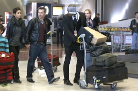 Halle Berry arrives for christmas in France at CDG airport in Paris 22.12.2012_28.jpg
