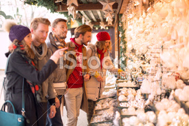 stock-photo-53211604-friends-shopping-at-christmas-fair.jpg