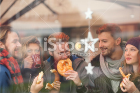 stock-photo-53257710-friends-having-hot-drinks-outdoors-in-winter-city.jpg