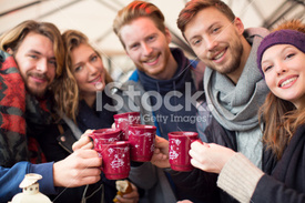 stock-photo-53257866-friends-having-hot-drinks-outdoors-in-winter-city.jpg