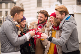 stock-photo-53723714-friends-having-hot-drinks-outdoors-in-winter-city.jpg