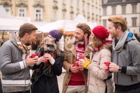 stock-photo-53723856-friends-having-hot-drinks-outdoors-in-winter-city.jpg