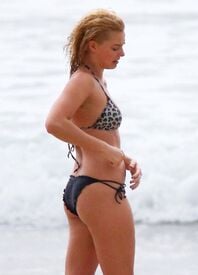 margot-robbie-in-a-bikini-at-a-beach-in-.jpg