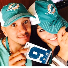 Me and my cousin @esantoslima at Dolphins game.jpg