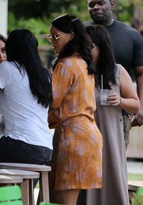 Rihanna-in-Mini-Dress-at-a-poolside-bar--07.jpg