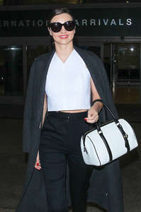 Miranda-Kerr-at-LAX-Airport-in-LA--11.jpg