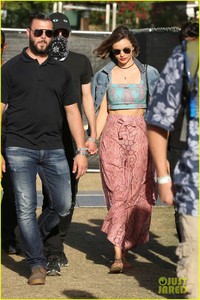 miranda-kerr-masked-evan-spiegel-hold-hands-at-coachella-07.jpg