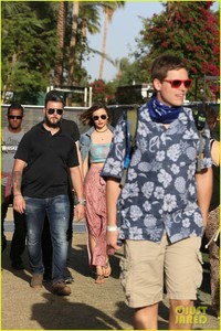 miranda-kerr-masked-evan-spiegel-hold-hands-at-coachella-09.jpg