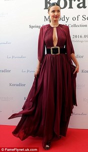 38D114E500000578-0-Elegant_The_floating_red_gown_was_secured_and_cinched_in_at_Mira-a-116_1474921717023.jpg