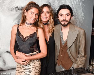 3C1A5DF500000578-4117390-Hands_on_Klum_wrapped_her_arm_around_the_pretty_DJ_also_shown_he-a-27_1484321692277.jpg