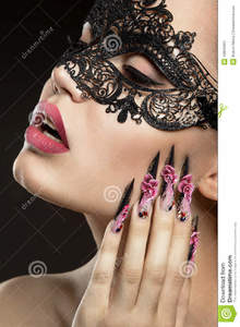 beautiful-girl-mask-long-fingernails-portrait-shot-studio-black-background-40843667.jpg