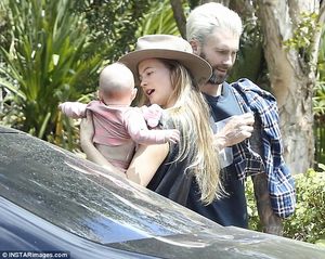 405AA25900000578-4508454-Teamwork_The_parents_took_turns_holding_the_baby_with_Behati_get-a-41_1494877023569.jpg