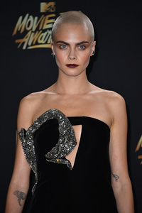 Cara Delevingne attends the 2017 MTV Movie and TV Awards at The Shrine Auditorium on May 7, 2017 in Los Angeles, California.  2.jpg