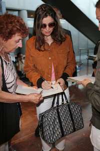 Laetitia-Casta-Arriving-at-Nice-Airport in-Cannes--08.jpg