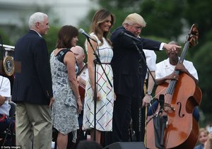 41A897A200000578-4631096-Donald_Trump_points_to_someone_in_the_crowd_while_standing_on_a_-a-55_1498181895792.jpg