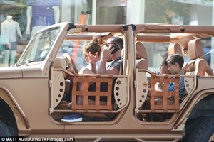 41C05E9A00000578-4639186-Engrossed_The_young_twins_appeared_to_be_distracted_by_their_gad-a-9_1498468908411.jpg