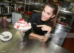 miss-universe-2017-iris-mittenaere-visit-buca-di-beppo-times-square-picture-id698474992.jpg