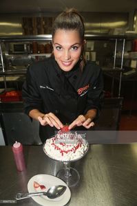 miss-universe-2017-iris-mittenaere-visit-buca-di-beppo-times-square-picture-id698475018.jpg