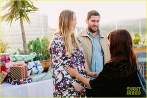 pregnant-whitney-port-cradles-baby-bump-at-her-baby-shower-08.jpg