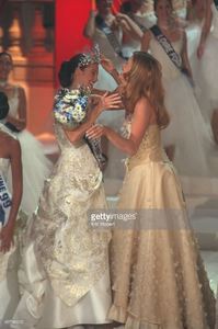 sophie-thalmann-miss-france-1998-hands-on-her-crown-to-the-winner-picture-id667980252.jpg