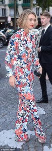 4208973F00000578-4665752-Flower_power_The_newly_engaged_beauty_went_for_head_to_toe_flora-a-201_1499200163053.jpg