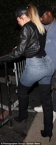 4242110400000578-4689914-Badass_in_black_Khloe_paired_ripped_blue_jeans_with_thigh_high_b-a-4_1499876643208.jpg