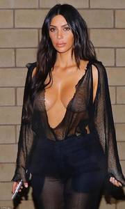 428773FB00000578-4716082-A_new_look_Kim_Kardashian_went_bra_free_in_a_sheer_netted_top_as-m-184_1500587182691.jpg