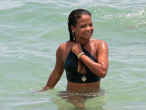 47715253_christina-milian-emerald-bikini-on-the-beach-in-miami-6.jpg