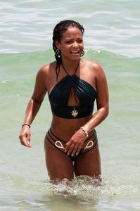 47715269_christina-milian-emerald-bikini-on-the-beach-in-miami-20.jpg