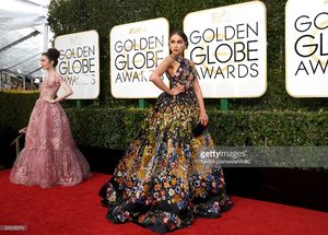 74th-annual-golden-globe-awards-pictured-actresses-lily-collins-and-picture-id631255276.jpg