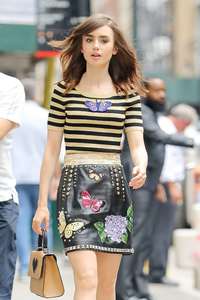 Lily-Collins-in-Mini-Skirt--10.jpg