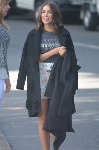 Olivia-Culpo-in-Mini-Skirt--06.jpg