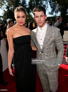 actress-olivia-culpo-and-recording-artist-nick-jonas-attend-the-57th-picture-id463010156.jpg