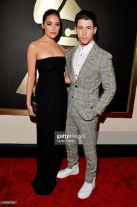 actress-olivia-culpo-and-recording-artist-nick-jonas-attend-the-57th-picture-id463011034.jpg