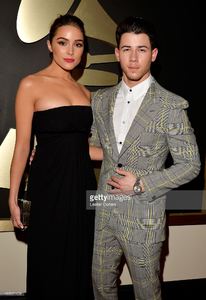 actress-olivia-culpo-and-recording-artist-nick-jonas-attend-the-57th-picture-id463021458.jpg