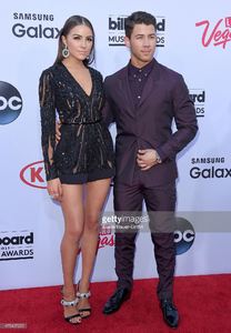 actress-olivia-culpo-and-singer-nick-jonas-arrive-at-the-2015-music-picture-id475407222.jpg