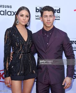 actress-olivia-culpo-and-singer-nick-jonas-arrive-at-the-2015-music-picture-id475407230.jpg