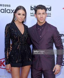 actress-olivia-culpo-and-singer-nick-jonas-arrive-at-the-2015-music-picture-id475407232.jpg