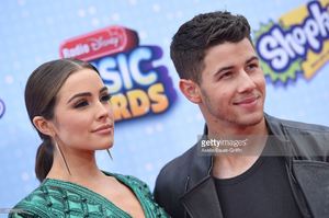 actress-olivia-culpo-and-singer-nick-jonas-arrive-at-the-2015-radio-picture-id472763024.jpg