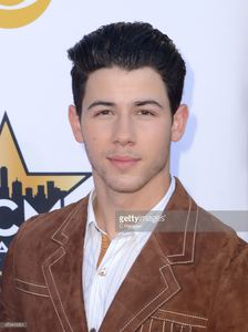 actress-olivia-culpo-and-singeractor-nick-jonas-attend-the-50th-of-picture-id470449004.jpg