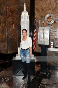 actress-olivia-culpo-poses-for-photos-during-the-lighting-ceremony-of-picture-id527697610.jpg