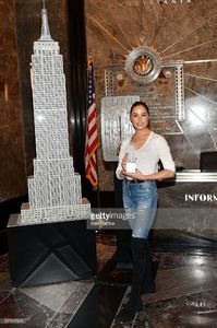 actress-olivia-culpo-poses-for-photos-during-the-lighting-ceremony-of-picture-id527697626.jpg