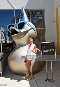 actress-olivia-culpo-poses-in-front-of-a-duck-statue-during-the-sobe-picture-id599738204.jpg
