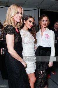 designers-karen-craig-and-georgina-chapman-pose-with-olivia-culpo-picture-id635557314.jpg