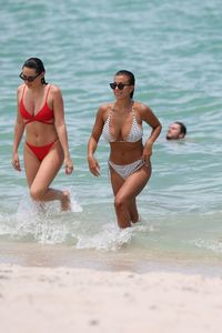 devin-brugman-in-a-tiny-striped-string-bikini-beach-in-miami-july-2017-7.jpg