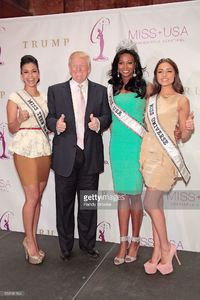 donald-trump-is-two-thumbs-up-while-surrounded-by-miss-teen-usa-logan-picture-id159181104.jpg